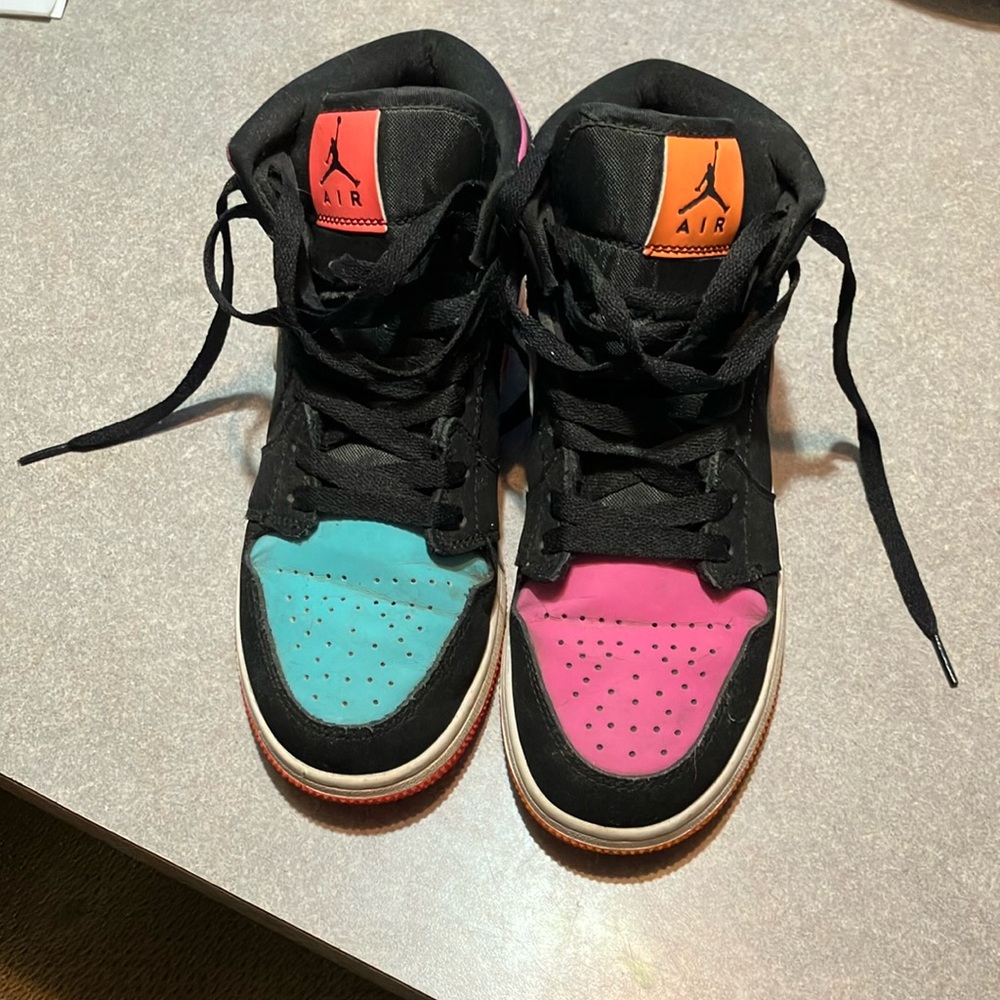 Black, Blue, Pink, orange Nike air Jordan’s worn but still in good condition!